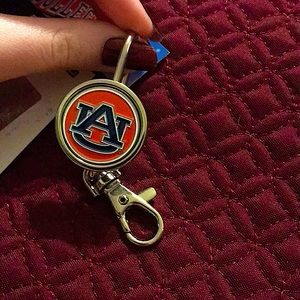 Auburn key holder, it goes on your purse so you don’t lose your keys.